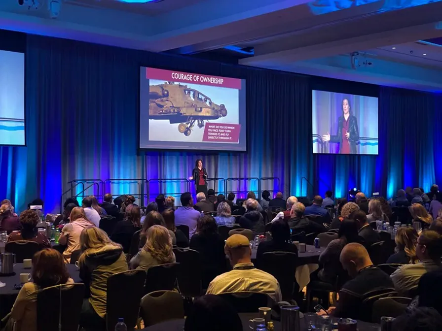 Shannon Huffman Polson delivering a keynote